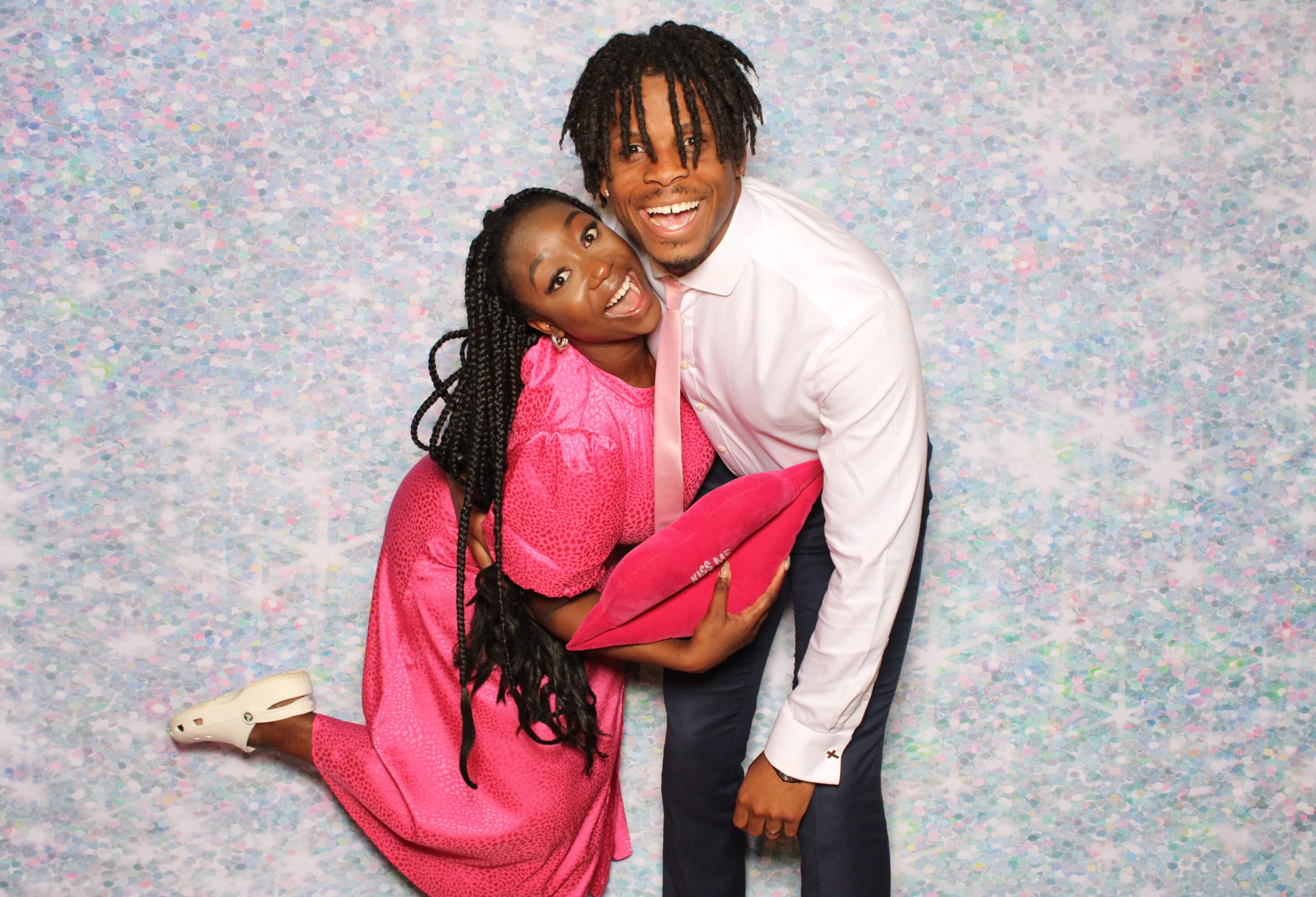 Couple enjoying a Smile photo booth at their wedding